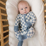 Blue Checkered Bamboo Zipper | The Blue Checkered Bamboo Zipper pajamas are a must-have for your baby's wardrobe. Made from soft bamboo fabric, these gender-neutral footed pajamas feature a convenient double zipper design that allows for easy diaper chang