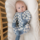 Blue Checkered Bamboo Zipper | The Blue Checkered Bamboo Zipper pajamas are a must-have for your baby's wardrobe. Made from soft bamboo fabric, these gender-neutral footed pajamas feature a convenient double zipper design that allows for easy diaper chang