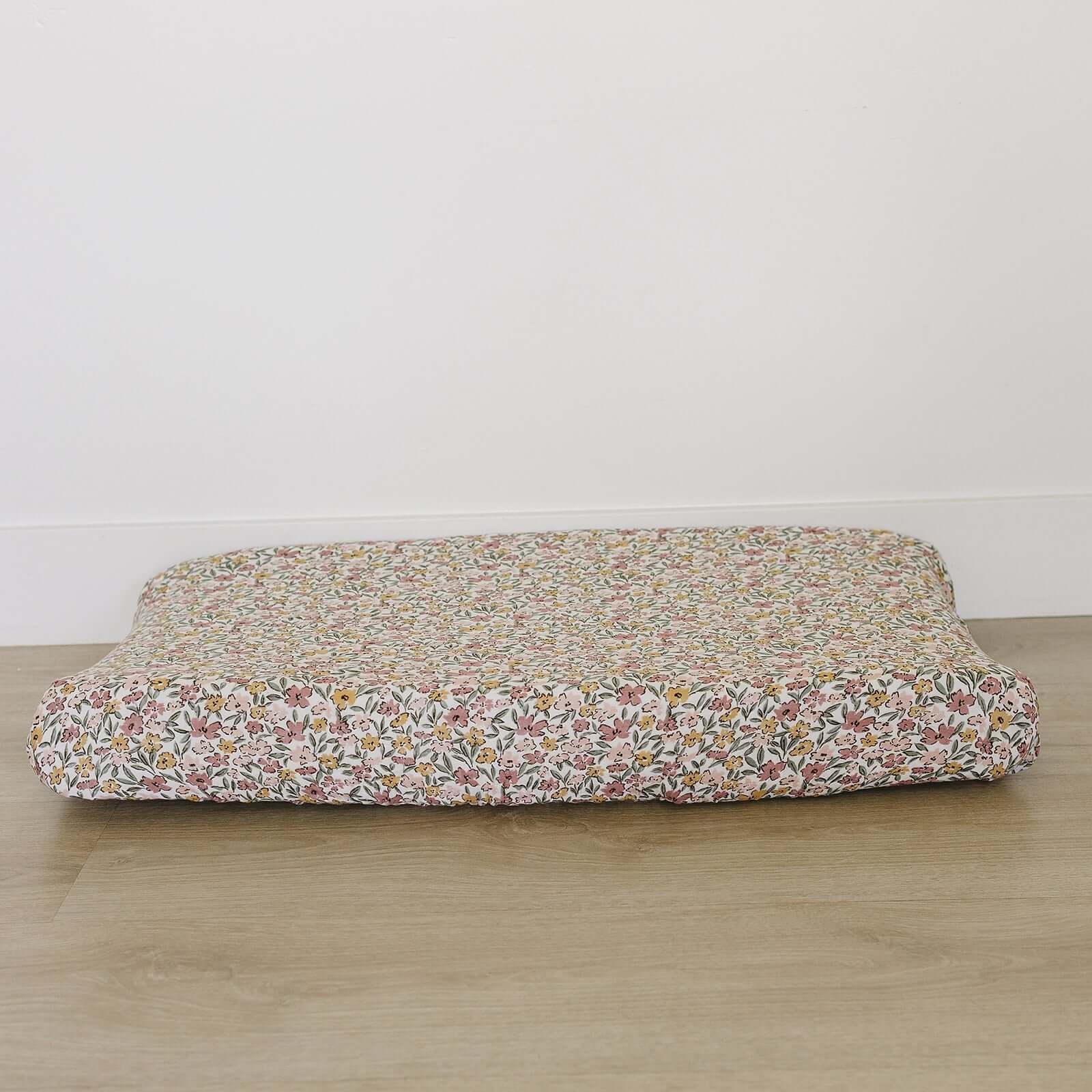 Sunny Petals Muslin Changing Pad Cover | Transform your baby's changing area with the Mebie Baby Sunny Petals Muslin Changing Pad Cover. Made from soft and breathable muslin fabric, this cover is gentle on your baby's skin. The fun design adds a touch of