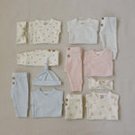 Berry Pointelle Layette Set | Delicate, timeless, and made for everyday softness, our Berry Pointelle Layette Set is crafted from breathable cotton with a classic pointelle knit for a beautifully heirloom-inspired look. Thoughtfully designed for newborn c