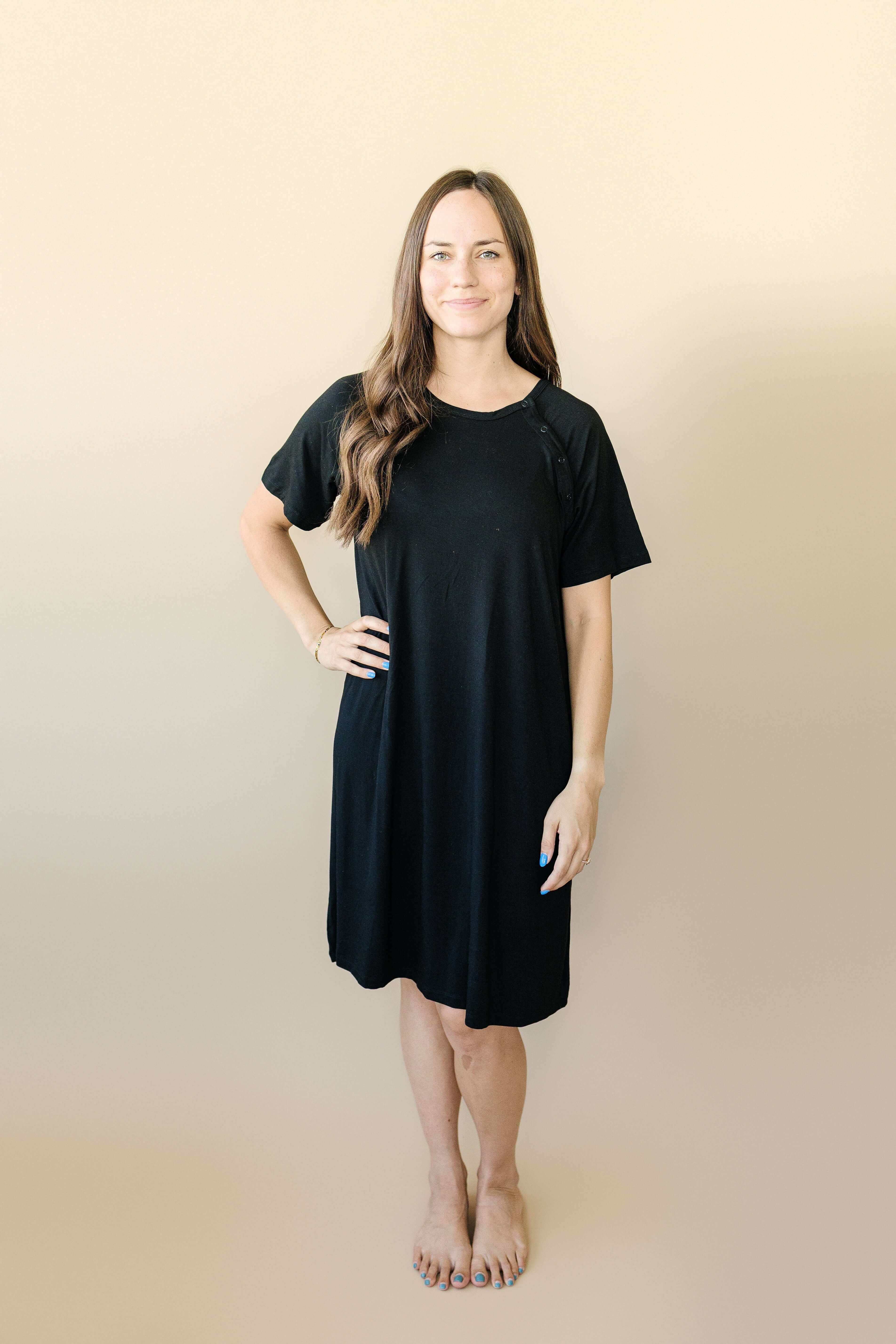 Woman wearing a black Bamboo Labor & Delivery Gown, designed for comfort during labor and postpartum.