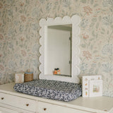 Liberty Floral Muslin Changing Pad Cover | Transform your baby's changing area with the Mebie Baby Cream Berry Muslin Changing Pad Cover. Made from soft and breathable muslin fabric, this cover is gentle on your baby's skin. The checkered design adds a to