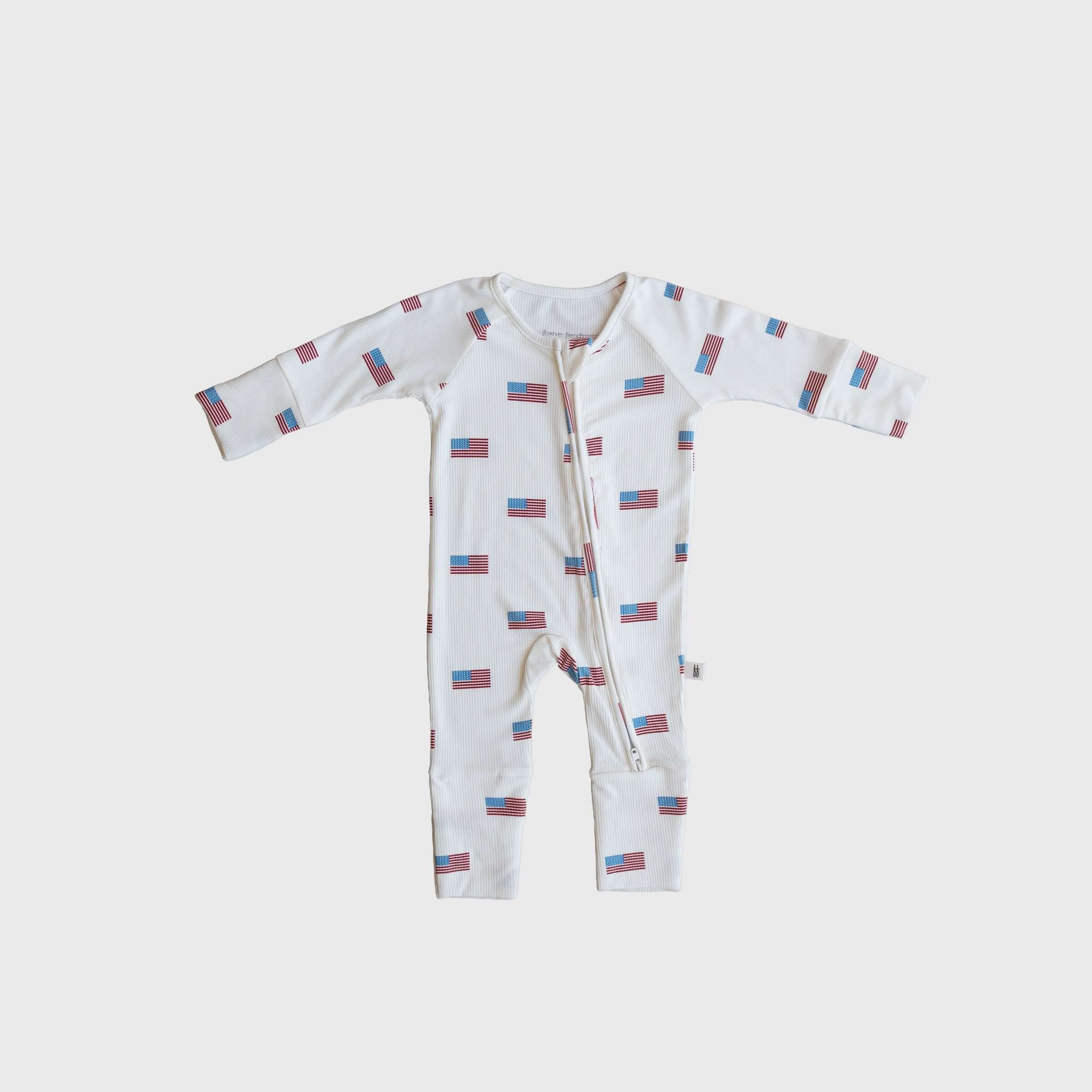 Americana  | Ribbed Bamboo Zip Pajamas featuring a playful flag print, perfect for cozy sleep and play.