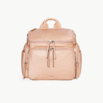 Caraa Baby Bag in blush nylon, featuring multiple compartments for parenting essentials and stylish design.