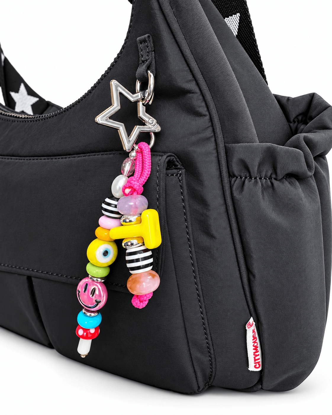 Cargo Crossbody Diaper Bag | The roomiest citymouse crossbody: 11 liters, two cargo pockets and room for four drinks, in a lightweight bag that looks like an everyday purse. | Milk & Baby
