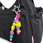 Cargo Crossbody Diaper Bag | The roomiest citymouse crossbody: 11 liters, two cargo pockets and room for four drinks, in a lightweight bag that looks like an everyday purse. | Milk & Baby