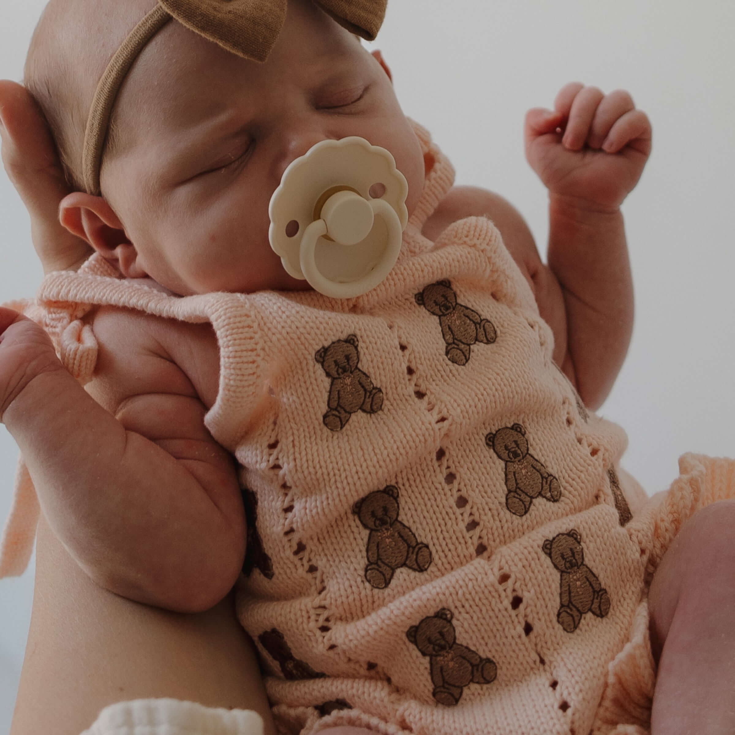 Lottie | Knit Ruffle Romper with embroidered teddy bears, perfect for babies | milk & baby.