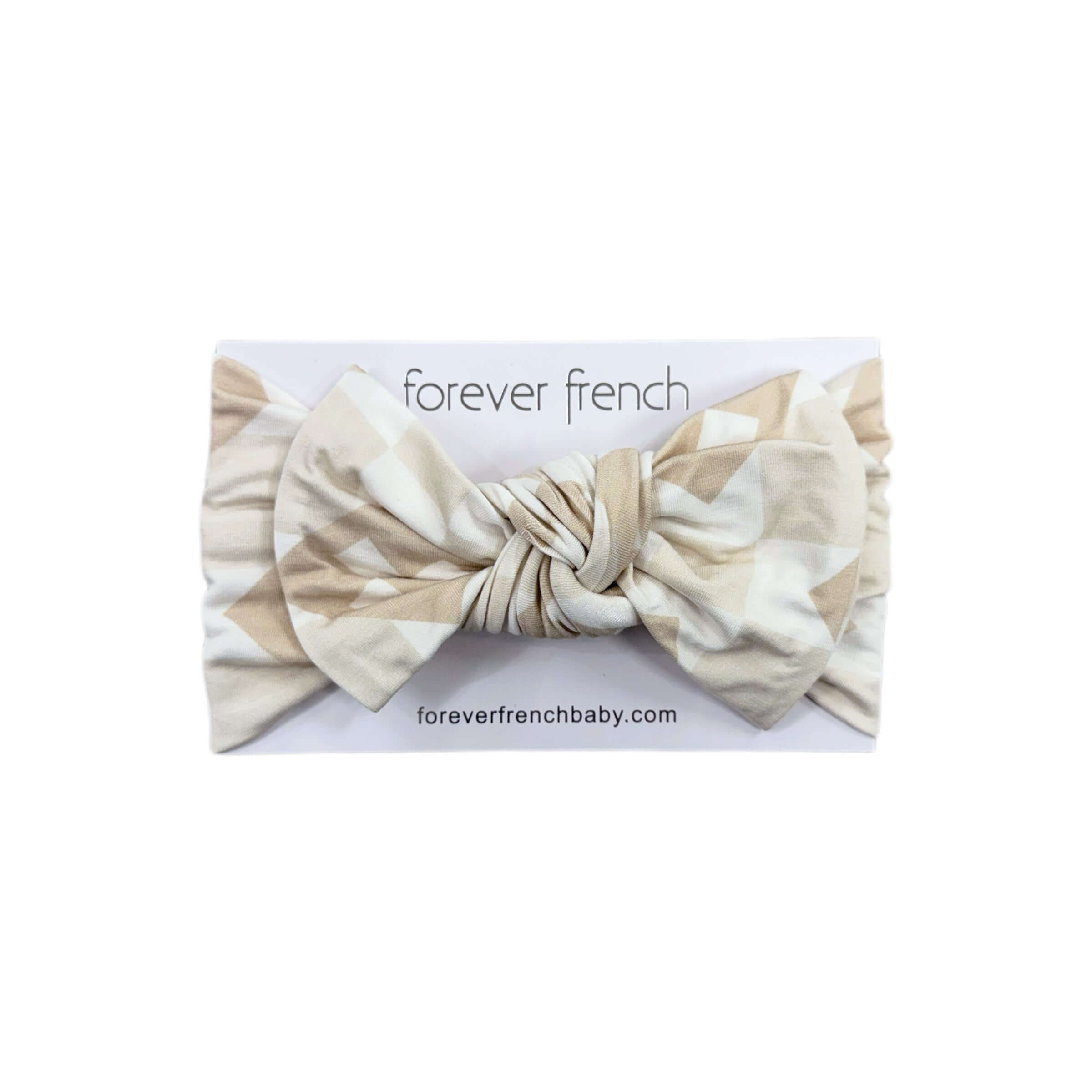 Cottage Quilt | Bamboo Head Wrap | Made from silky-soft bamboo material, this adjustable head wrap features a sweet bow for added style. Perfect for babies and toddlers!One size fits most Print: Cottage Quilt (a neutral quilted pattern) Material: 95% bamb