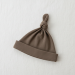 Cocoa Organic Ribbed Newborn Knot Hat - Minimal Flat Lay