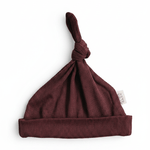 Deep Violet Ribbed Bamboo Newborn Knot Hat - Portrait