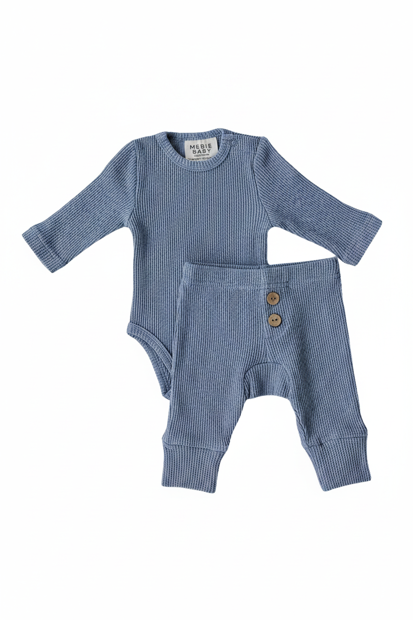 Dusty Blue Waffle Set | Milk & Baby | Comfy, cozy, and cute — our Dusty Blue Waffle Set is an everyday essential. Made from soft waffle-knit fabric, this matching set includes a long sleeve bodysuit and relaxed-fit pants for a cozy, all-day feel. Snaps at