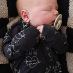 Flaming Hearts | Bamboo Zip Pajamas | Made of the softest premium bamboo. Durable and well designed your little ones can sleep and play in these cozy pajamas. All sizes have rollover cuffs on the hands and cuffs on the feet giving you the option to go foo