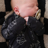 Flaming Hearts | Bamboo Zip Pajamas | Made of the softest premium bamboo. Durable and well designed your little ones can sleep and play in these cozy pajamas. All sizes have rollover cuffs on the hands and cuffs on the feet giving you the option to go foo
