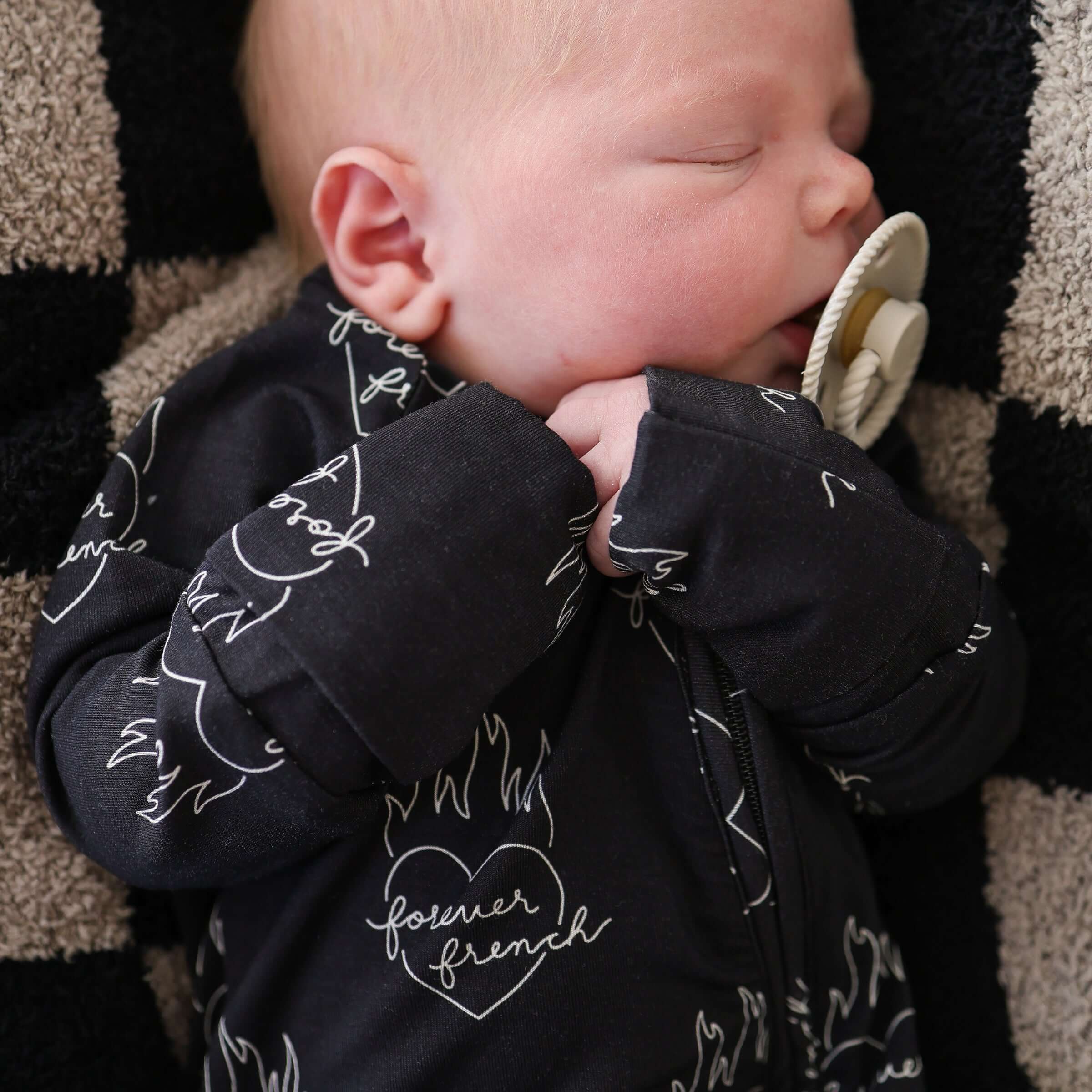 Flaming Hearts | Bamboo Zip Pajamas | Made of the softest premium bamboo. Durable and well designed your little ones can sleep and play in these cozy pajamas. All sizes have rollover cuffs on the hands and cuffs on the feet giving you the option to go foo