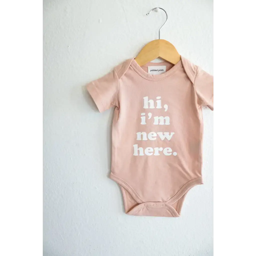 Hi, I'm New Here in Rose Organic Cotton Baby Onesie | Milk & Baby