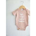 Hi, I'm New Here in Rose Organic Cotton Baby Onesie | Milk & Baby