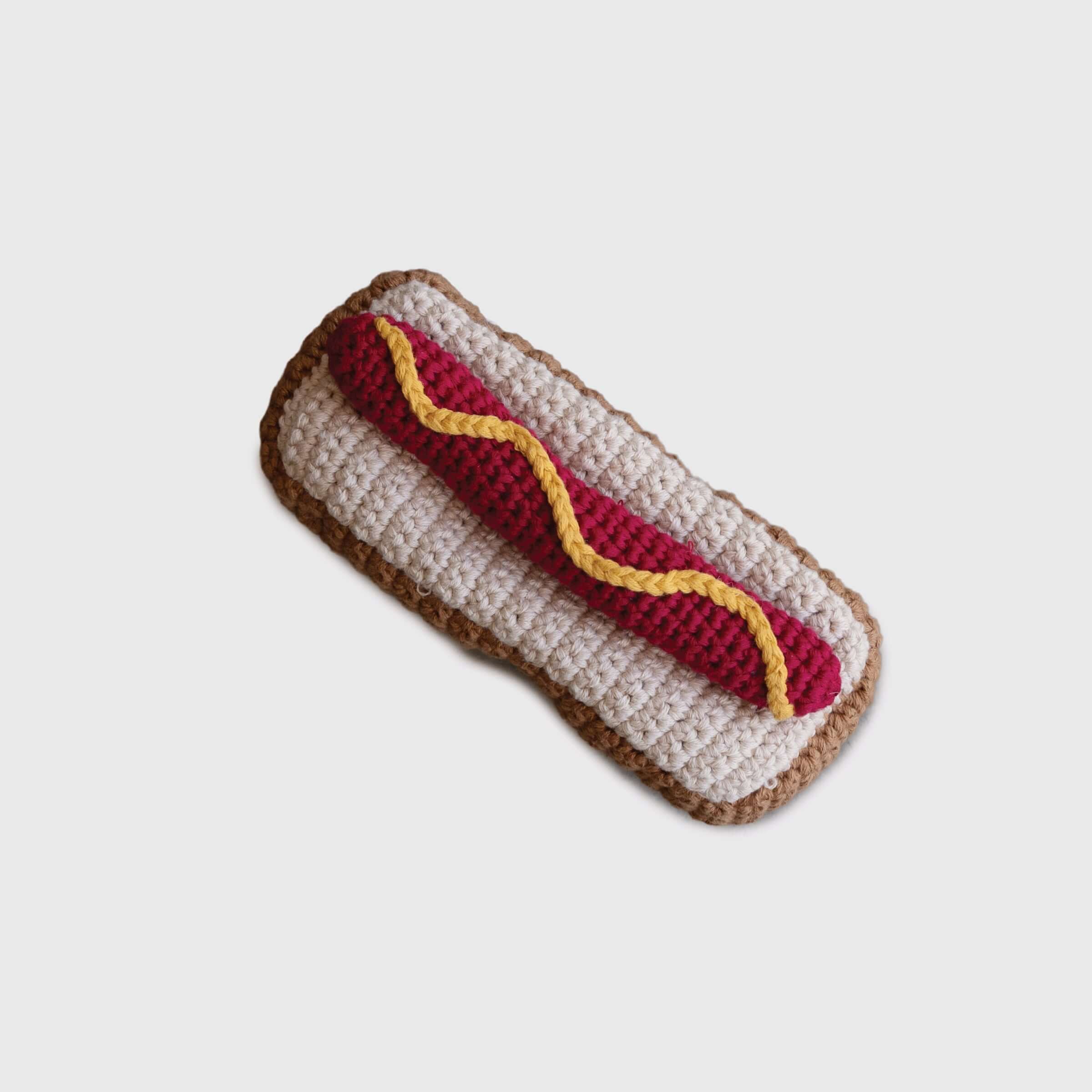 Knit Rattle | Hot Dog toy for babies, perfect for summer fun with cheerful jingles.