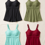 Journey pumping tanks in a clean four-color flat lay