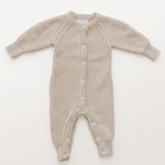 Oatmeal knit button romper with more space and a subtle background