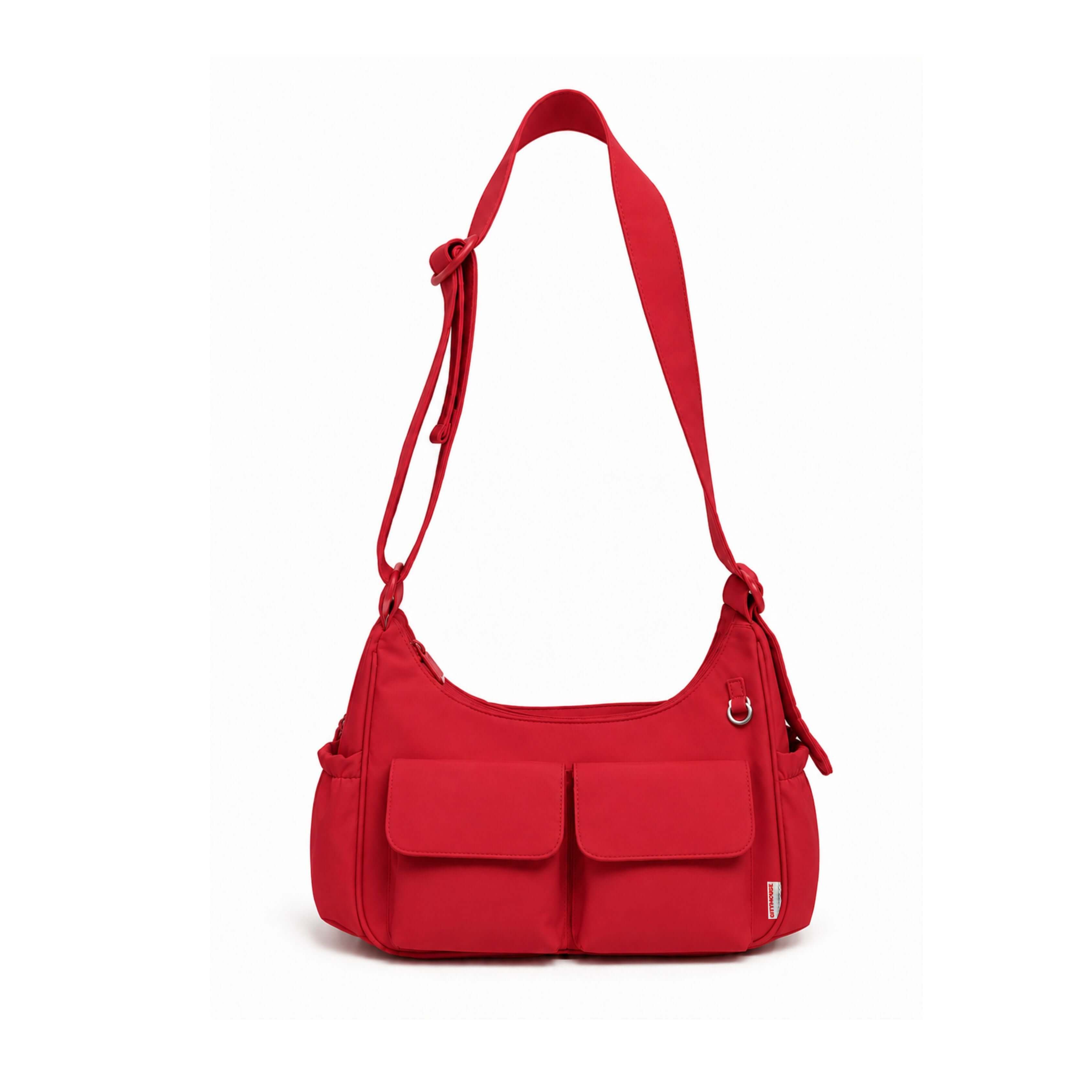 Cargo Crossbody Diaper Bag | The roomiest citymouse crossbody: 11 liters, two cargo pockets and room for four drinks, in a lightweight bag that looks like an everyday purse. | Milk & Baby