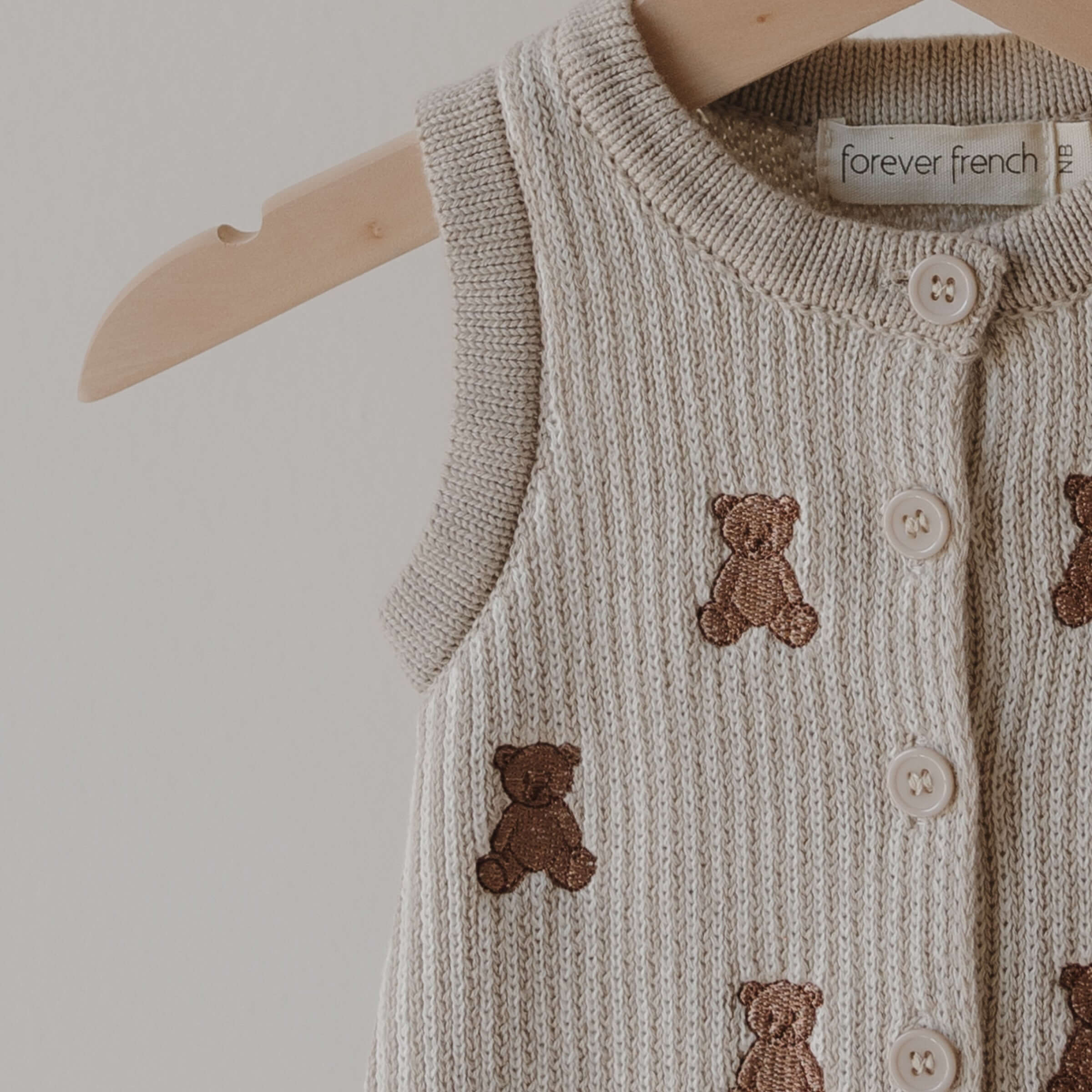 Teddy | Knit Romper featuring embroidered teddy bears and buttons | milk & baby