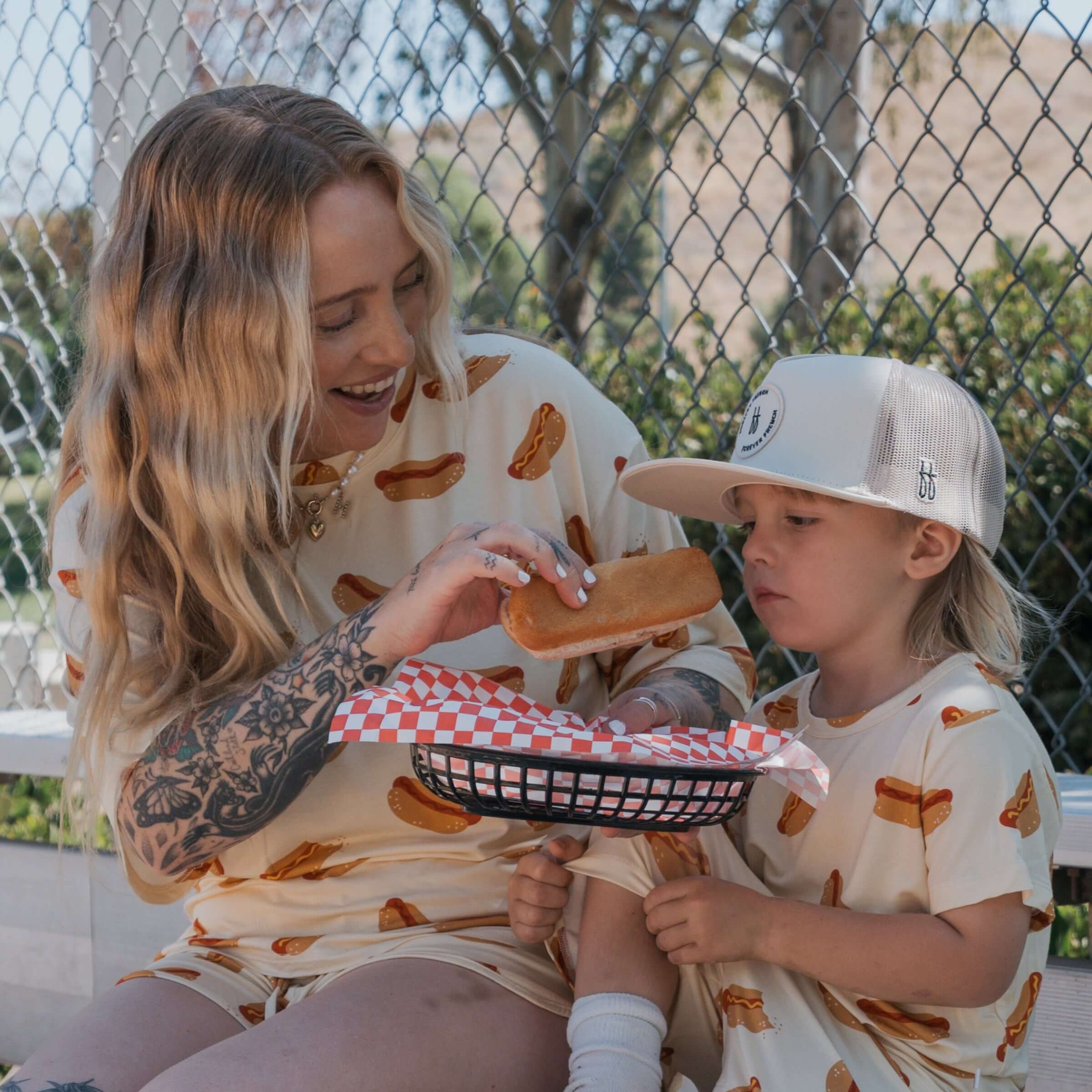 Hot Dogs | Women's Bamboo Short Set featuring a woman and child enjoying hot dogs outdoors.