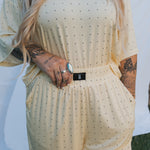 Model wearing Veda Women's Boxy Tee Lounge Set in yellow with black polka dots, showcasing relaxed style and comfort.