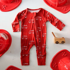 Fire Truck | Bamboo Zip Pajamas | Made of the softest premium bamboo. Durable and well designed your little ones can sleep and play in these cozy pajamas. All sizes have rollover cuffs on the hands and on the feet giving you the option to go footless or f