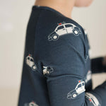 Police Cruiser | Bamboo Zip Pajamas | Made of the softest premium bamboo. Durable and well designed your little ones can sleep and play in these cozy pajamas. All sizes have rollover cuffs on the hands and on the feet giving you the option to go footless