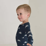 Police Cruiser | Bamboo Zip Pajamas | Made of the softest premium bamboo. Durable and well designed your little ones can sleep and play in these cozy pajamas. All sizes have rollover cuffs on the hands and on the feet giving you the option to go footless