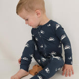 Police Cruiser | Bamboo Zip Pajamas | Made of the softest premium bamboo. Durable and well designed your little ones can sleep and play in these cozy pajamas. All sizes have rollover cuffs on the hands and on the feet giving you the option to go footless