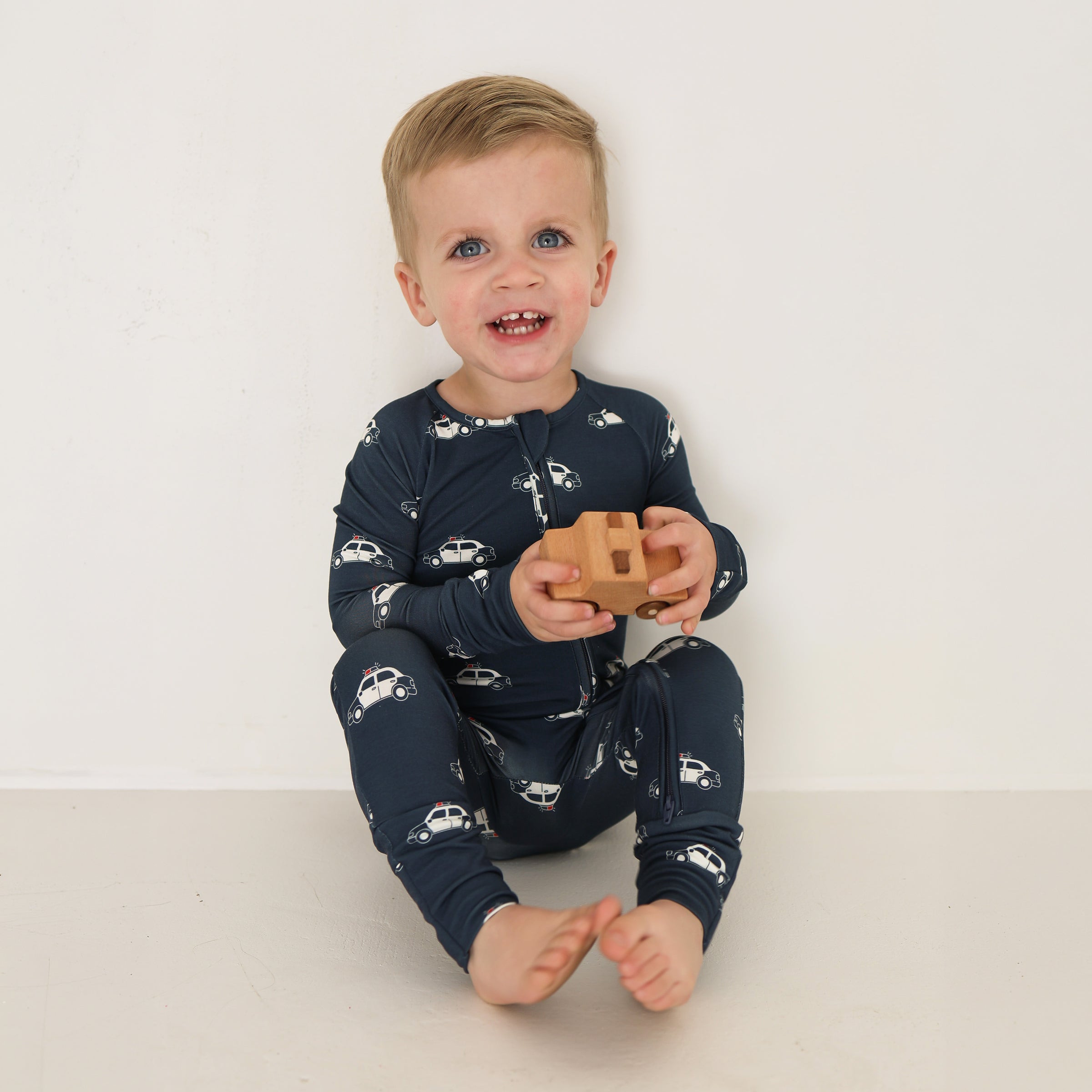 Police Cruiser | Bamboo Zip Pajamas | Milk & Baby